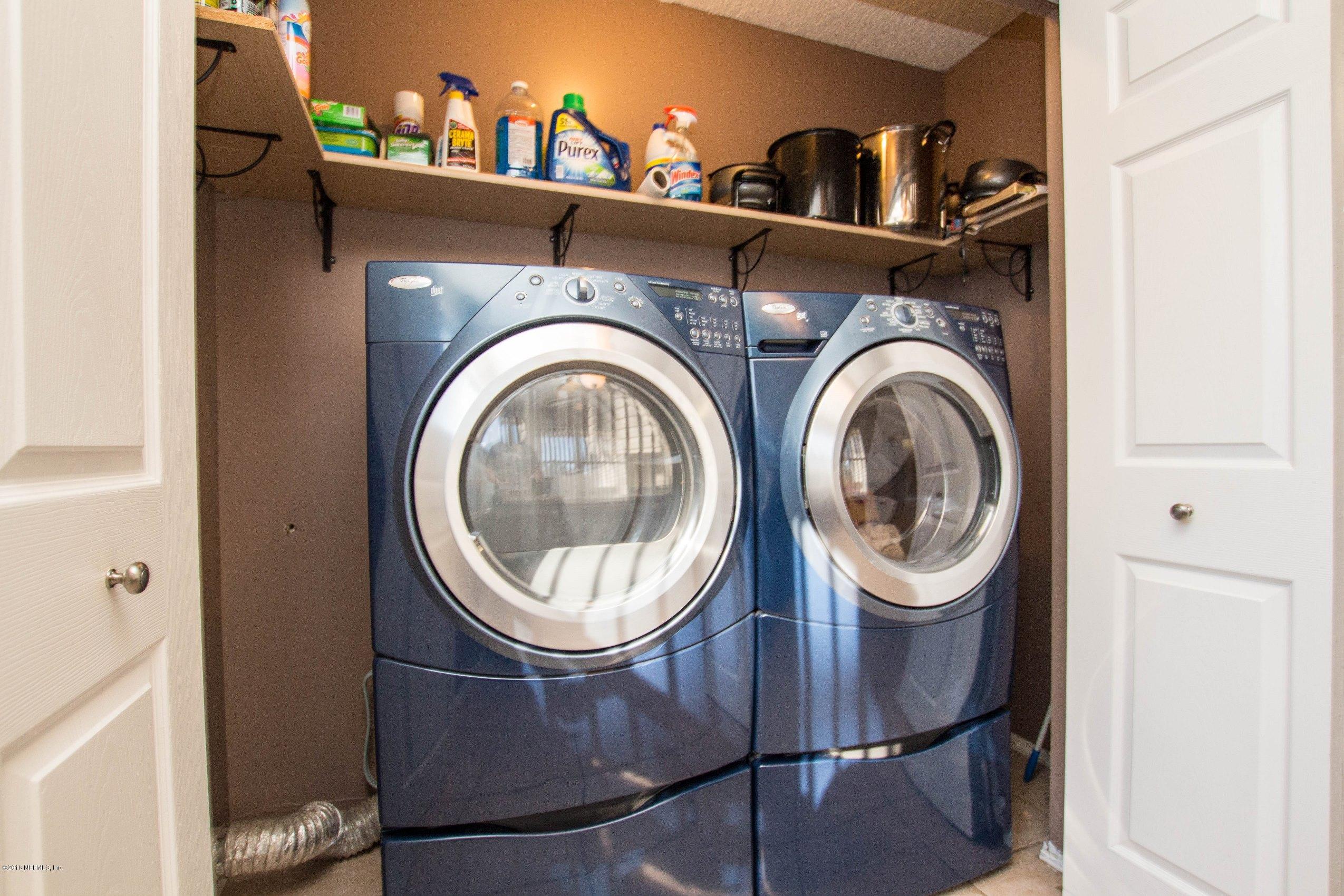 1609 Derringer Road Jacksonville, FL 32225 - Photo 12 of 33 a close view of utility room with washer and dryer