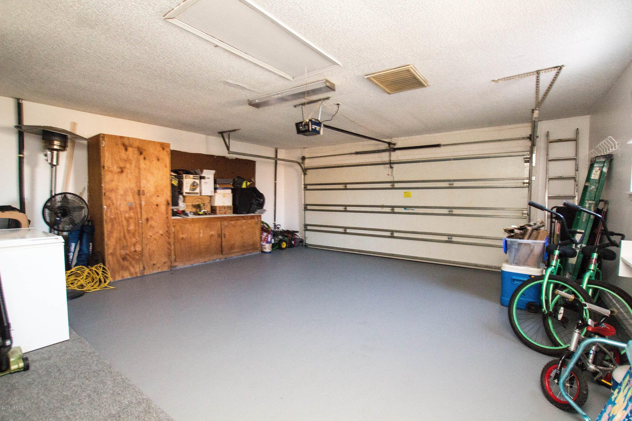 1609 Derringer Road Jacksonville, FL 32225 - Photo 26 of 33 a view of room with storage and utility