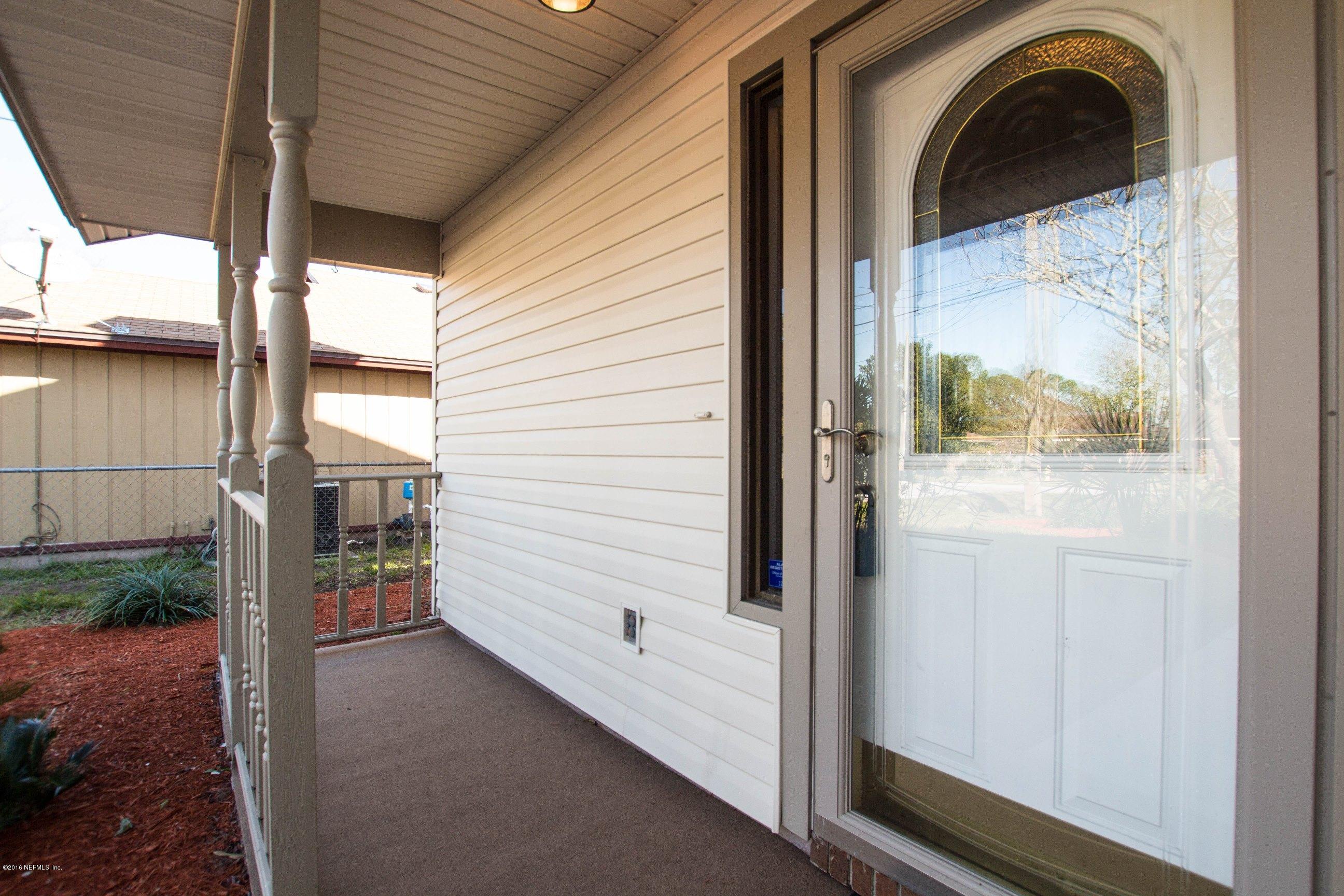 1609 Derringer Road Jacksonville, FL 32225 - Photo 31 of 33 a view of a porch with furniture