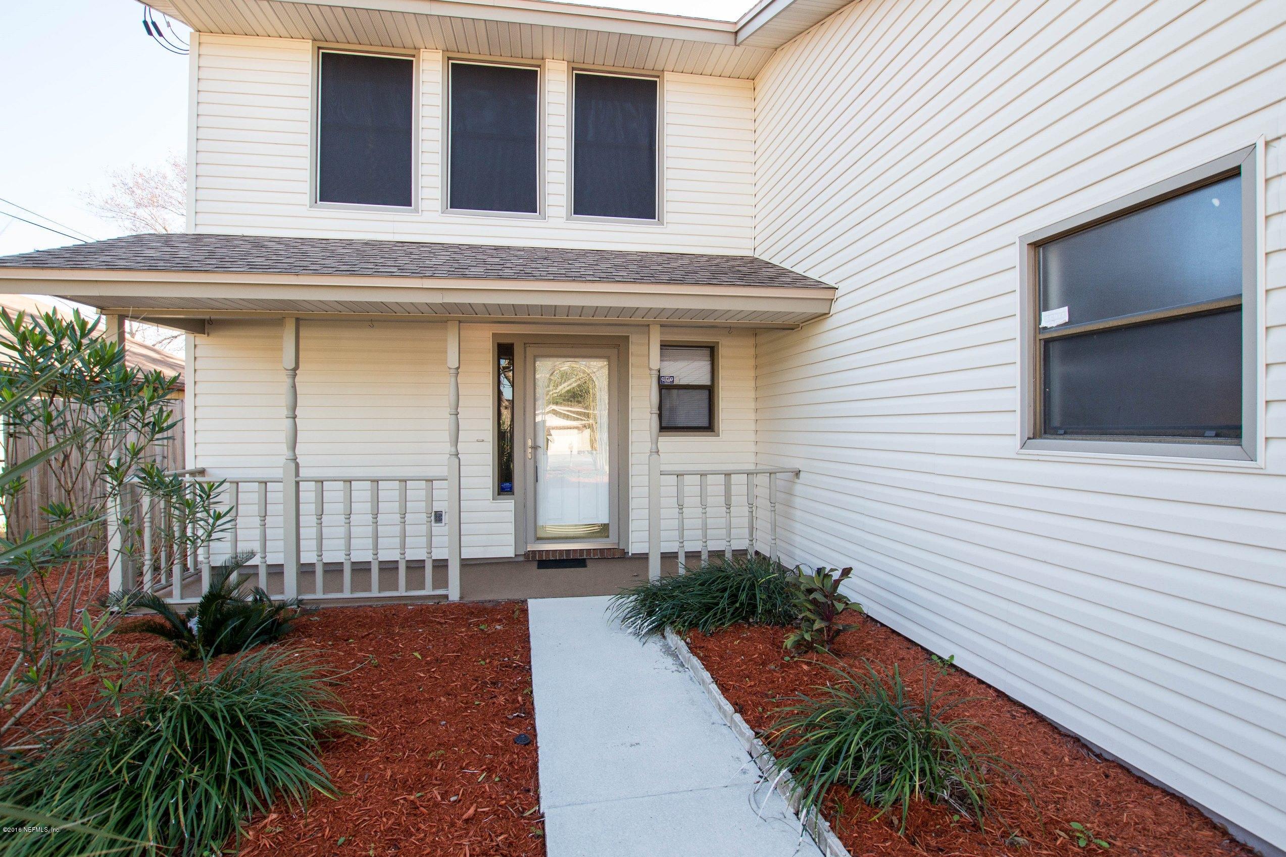 1609 Derringer Road Jacksonville, FL 32225 - Photo 10 of 33 a front view of a house with a yard