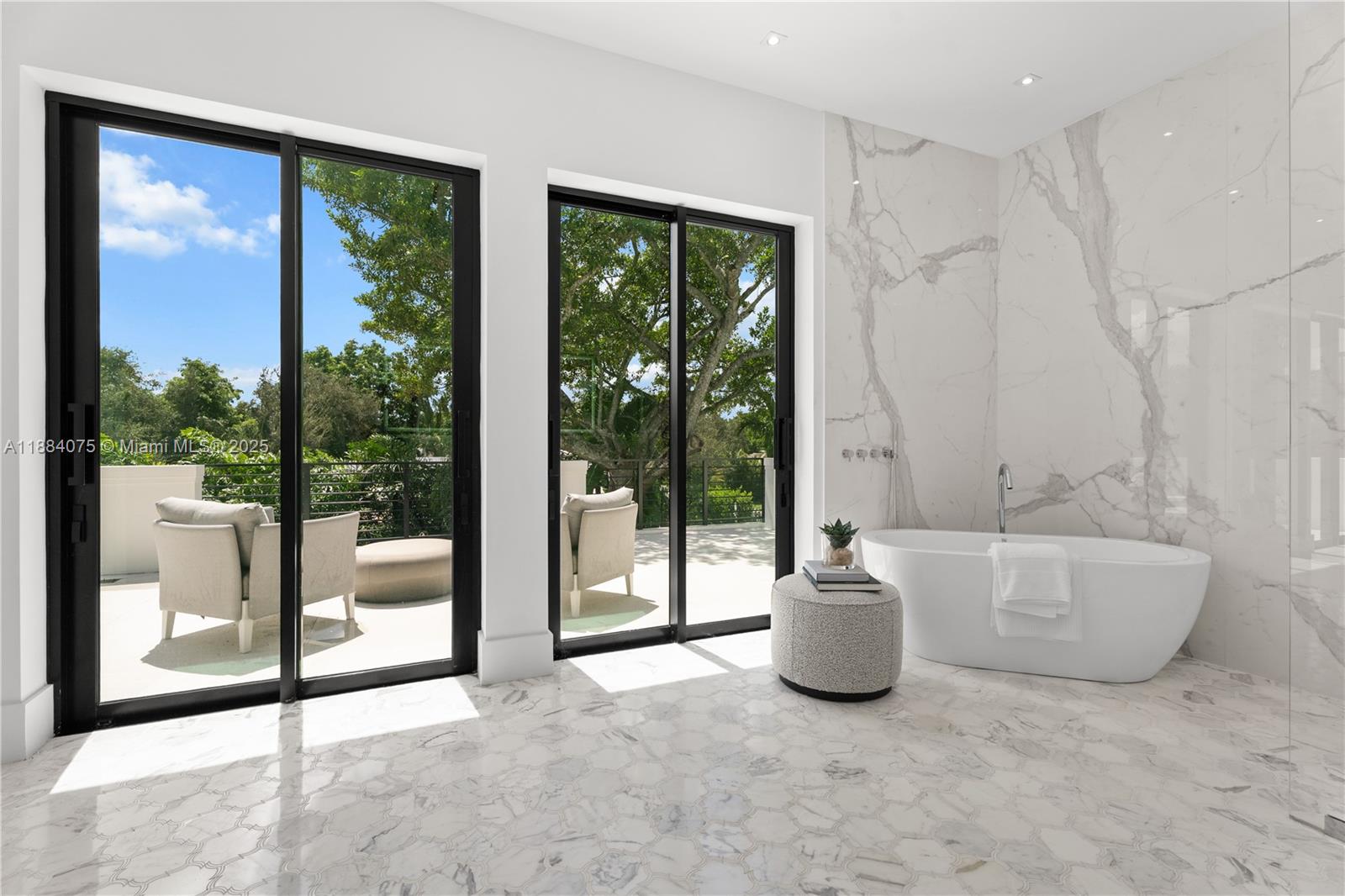 7001 Southwest 71st Avenue Miami, FL 33143 - Photo 13 of 50 a living room with furniture and a floor to ceiling window