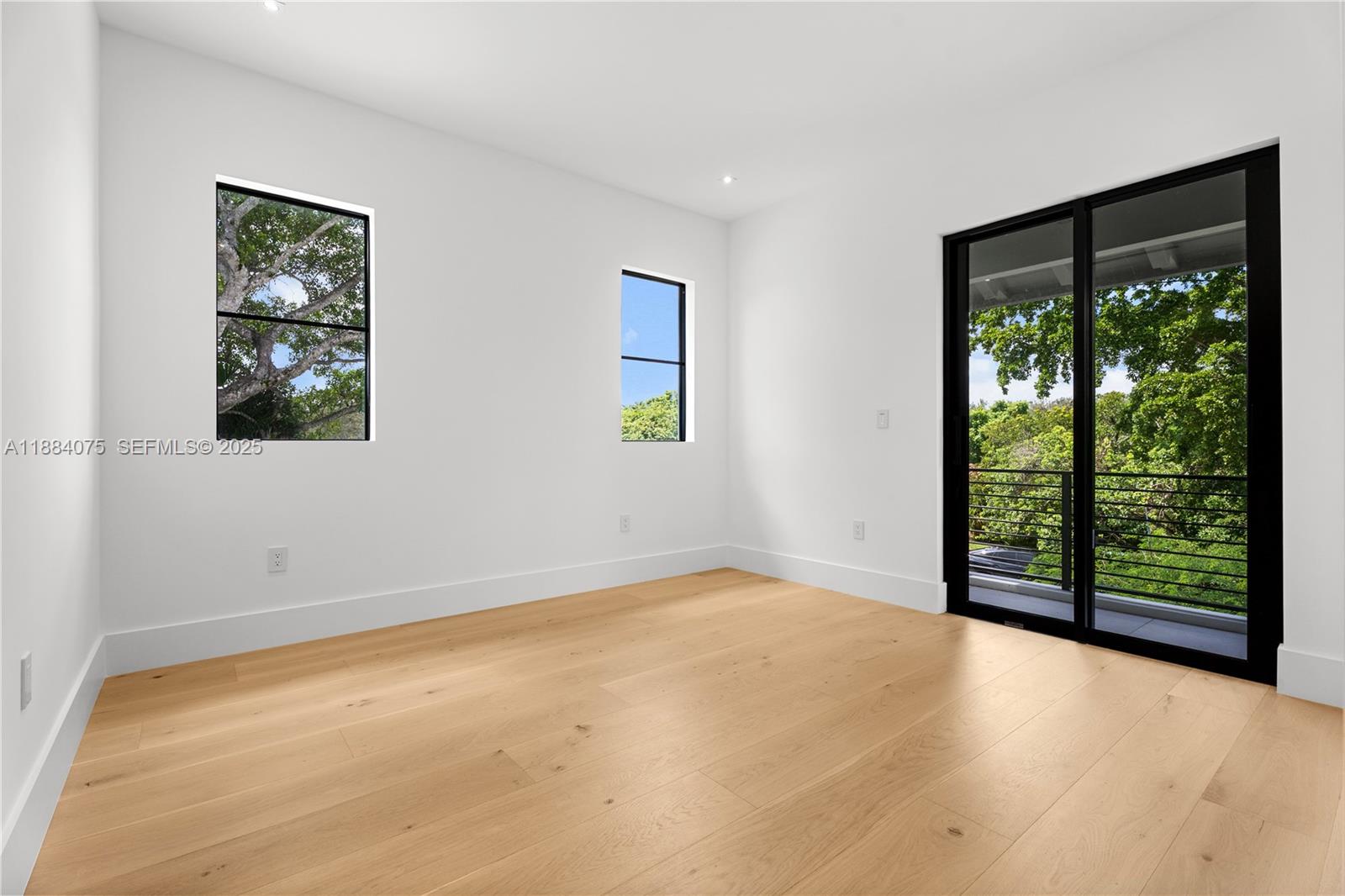 7001 Southwest 71st Avenue Miami, FL 33143 - Photo 17 of 50 a view of an empty room with a window