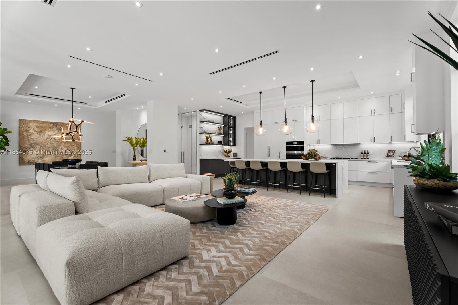 7001 Southwest 71st Avenue Miami, FL 33143 - Photo 3 of 50 a living room with furniture and a flat screen tv