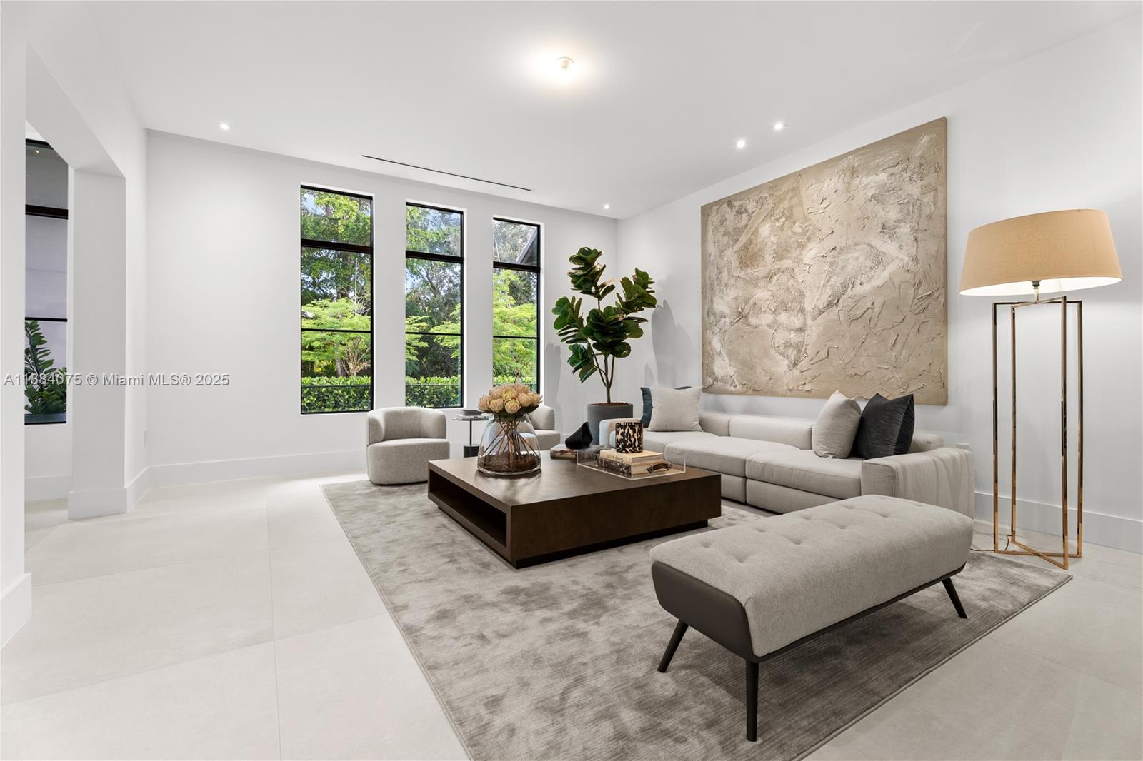 7001 Southwest 71st Avenue Miami, FL 33143 - Photo 31 of 50 a living room with furniture and a large window