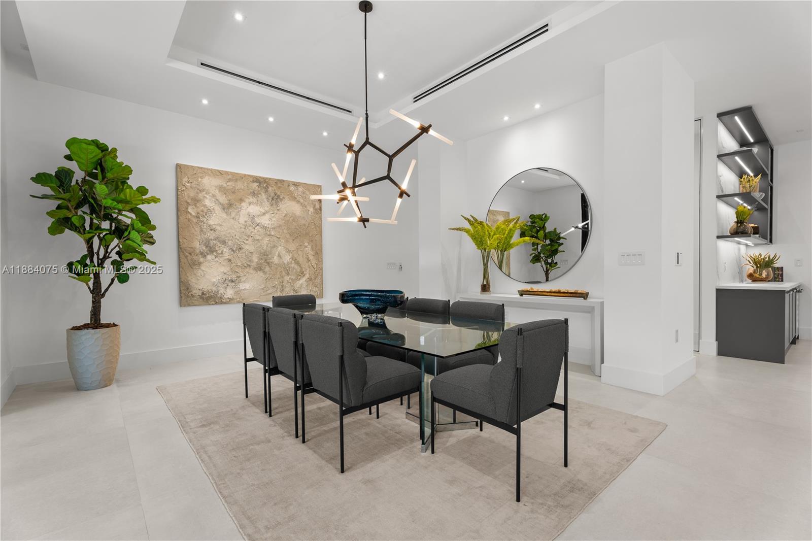 7001 Southwest 71st Avenue Miami, FL 33143 - Photo 37 of 50 a view of a dining room with furniture a chandelier and wooden floor