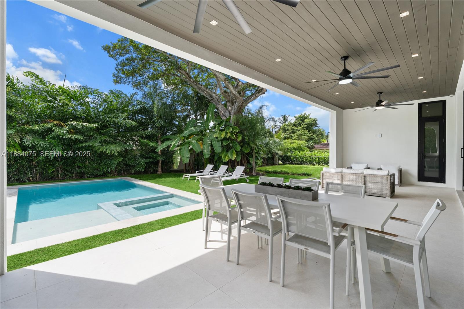 7001 Southwest 71st Avenue Miami, FL 33143 - Photo 42 of 50 a view of a dining room with furniture garden and plants