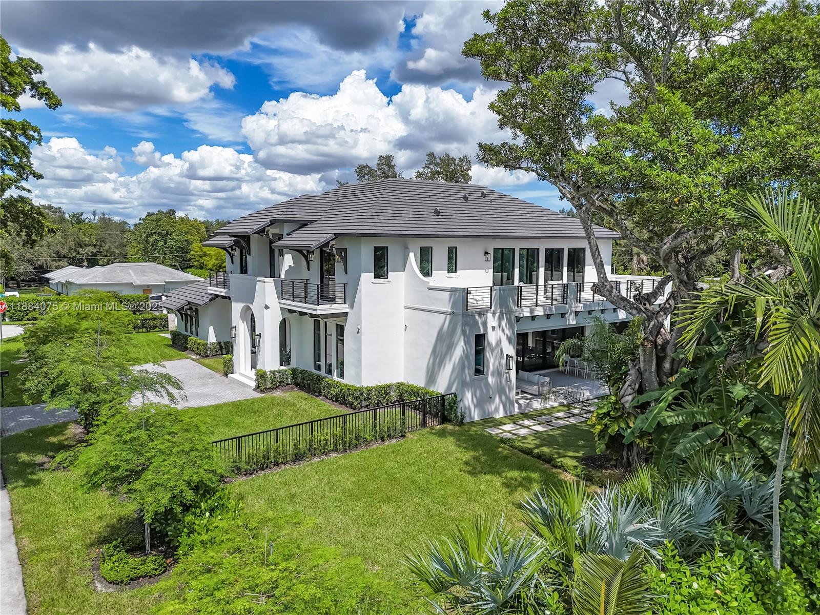 7001 Southwest 71st Avenue Miami, FL 33143 - Photo 44 of 50 a view of a house with backyard and garden