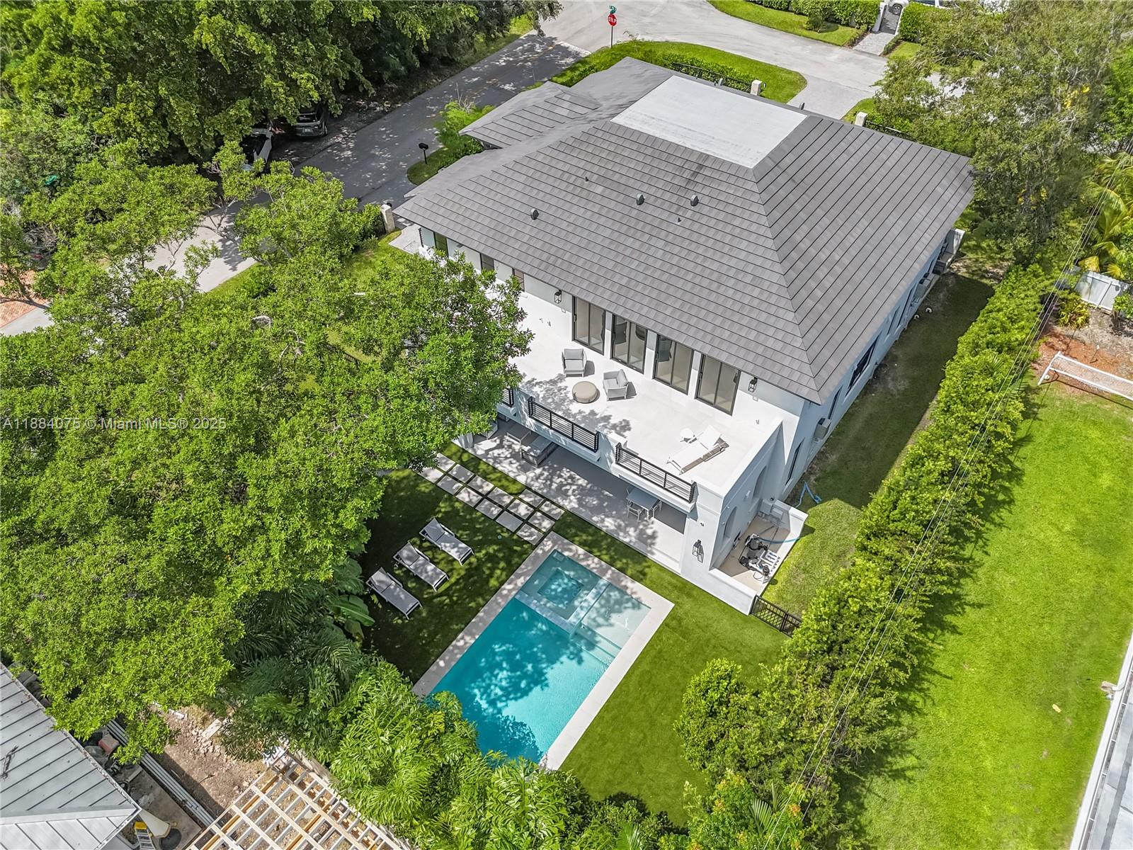 7001 Southwest 71st Avenue Miami, FL 33143 - Photo 45 of 50 an aerial view of a house with a yard