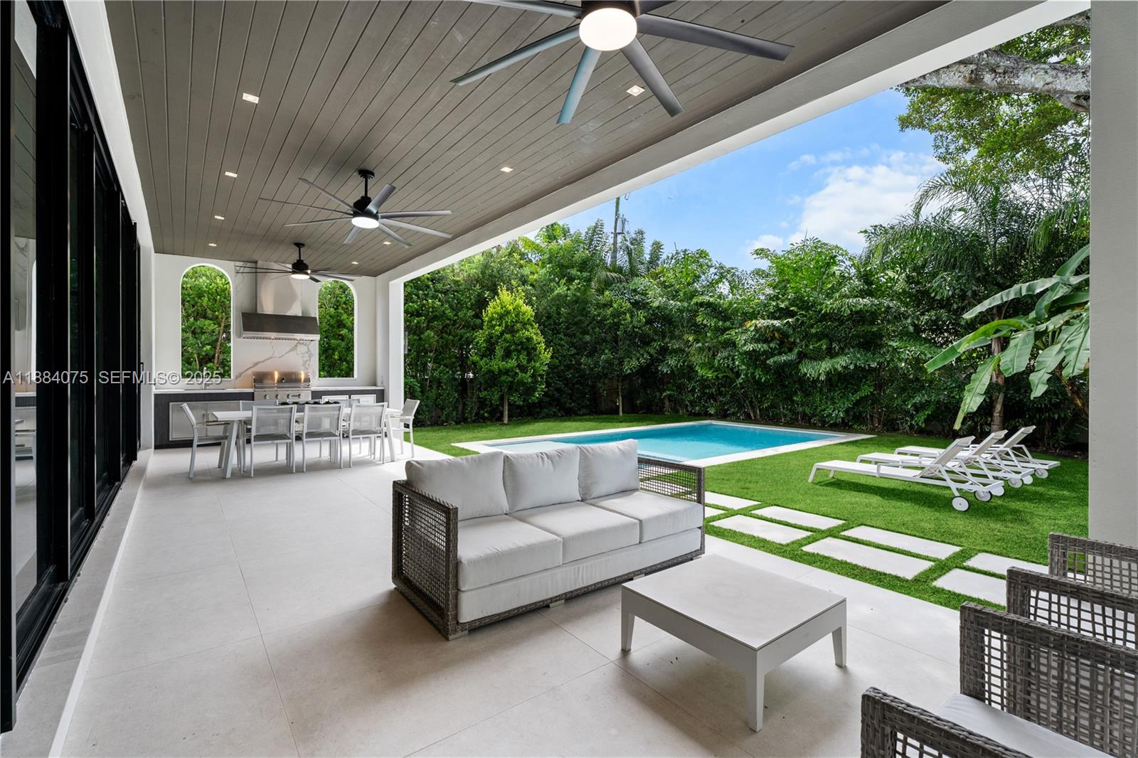 7001 Southwest 71st Avenue Miami, FL 33143 - Photo 7 of 50 a patio with garden view and patio