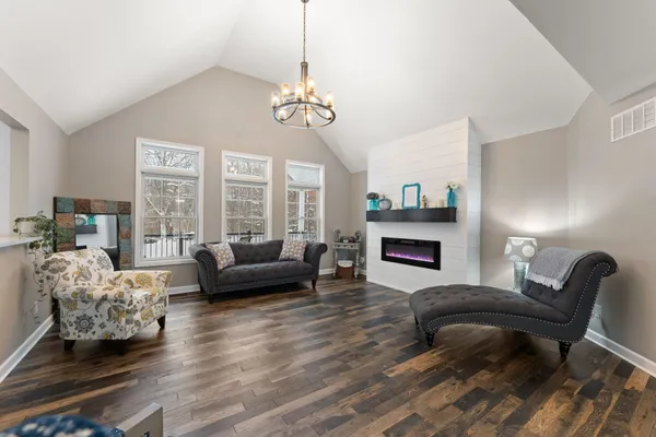a view of a living room and entry way