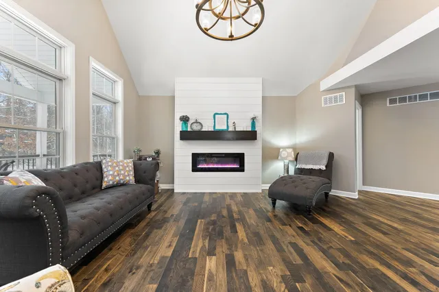 a backyard of a house with lots of green space