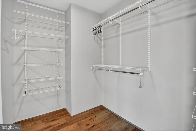 a bathroom with a toilet sink and shower