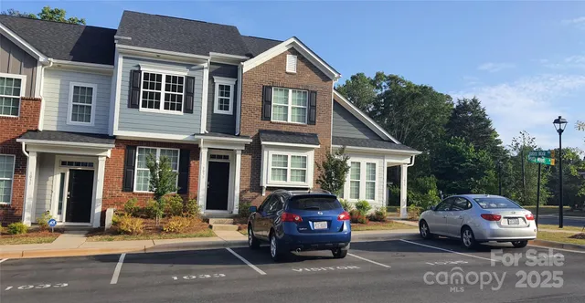 a car parked in front of a house