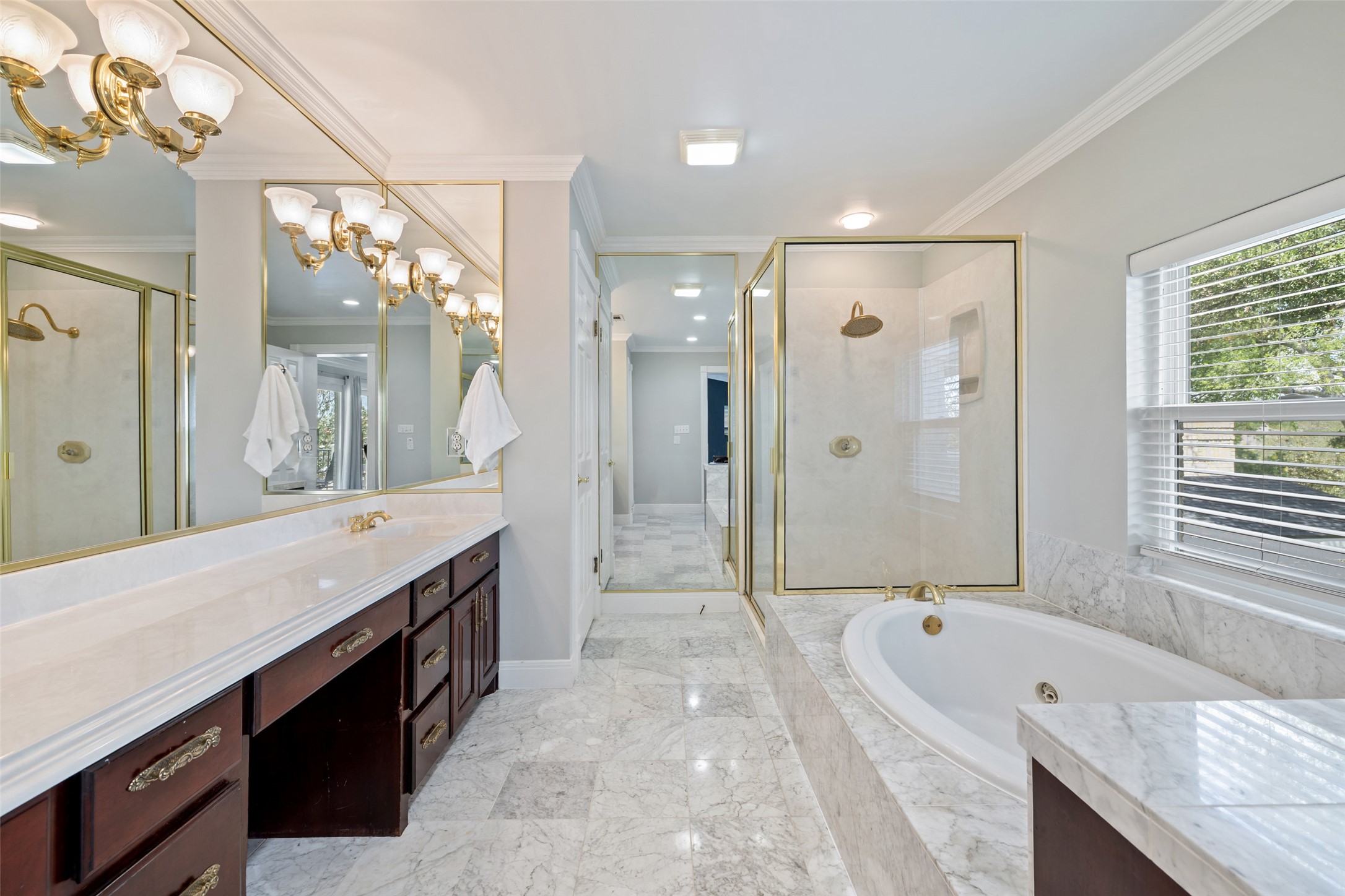 17700 North Rim Drive Leander, TX 78641 - Photo 30 of 38 Full bathroom featuring a walk in shower, vanity, tiled flooring, and a soaking tub