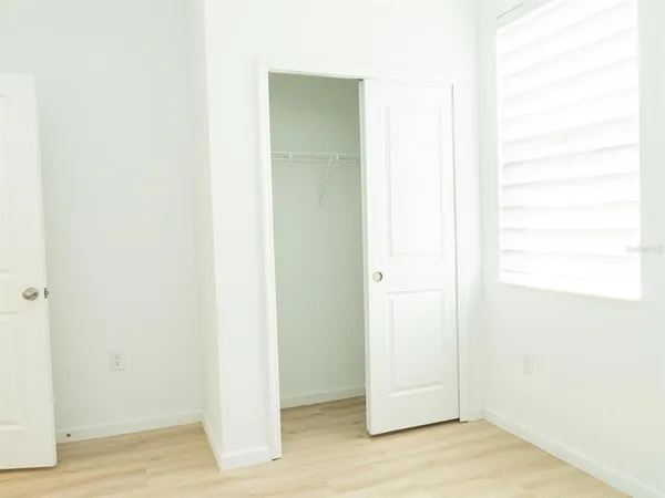a view of a bathroom from a hallway