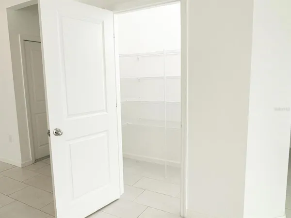 a view of a room that has a window in it