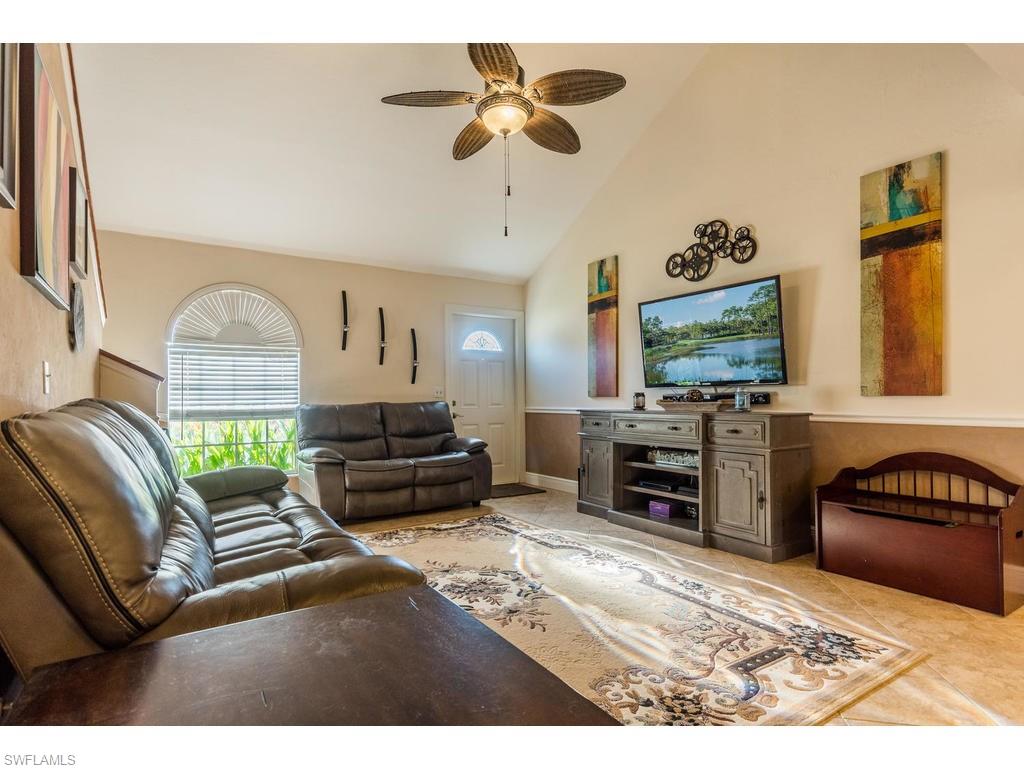 17208 Trellis Road Fort Myers, FL 33967 - Photo 1 of 22 a living room with furniture and a flat screen tv