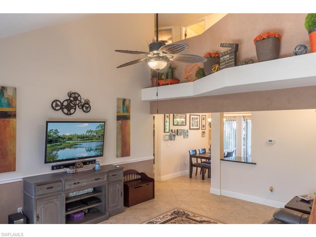 17208 Trellis Road Fort Myers, FL 33967 - Photo 13 of 22 a living room with furniture and a flat screen tv