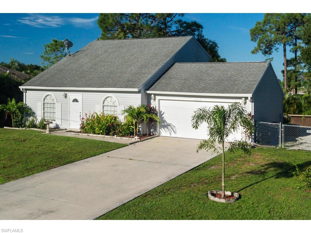 17208 Trellis Road Fort Myers, FL 33967 - Photo 2 of 22 a view of a house with a yard
