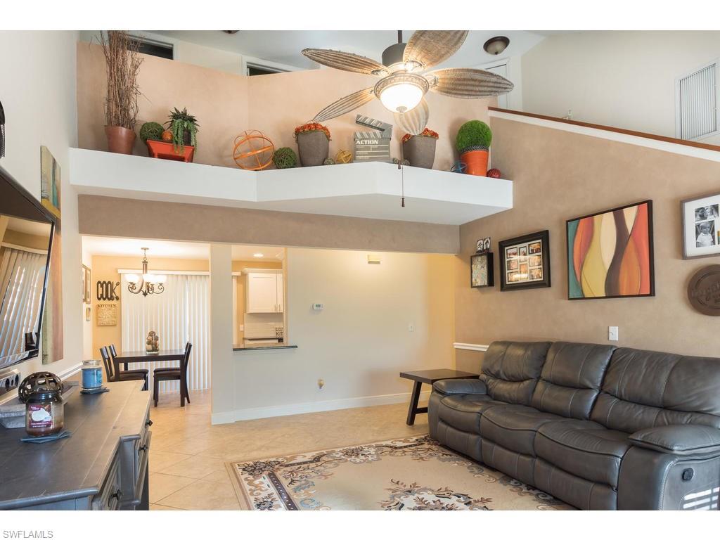 17208 Trellis Road Fort Myers, FL 33967 - Photo 5 of 22 a living room with furniture and a flat screen tv