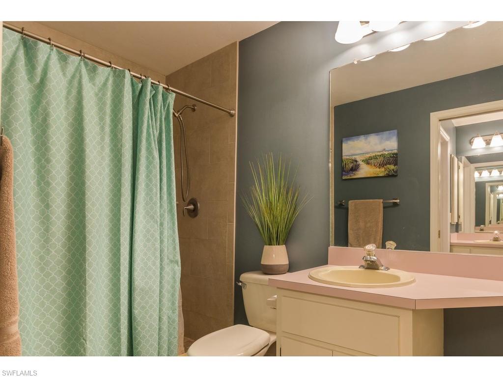 17208 Trellis Road Fort Myers, FL 33967 - Photo 9 of 22 a bathroom with a sink a mirror and a toilet
