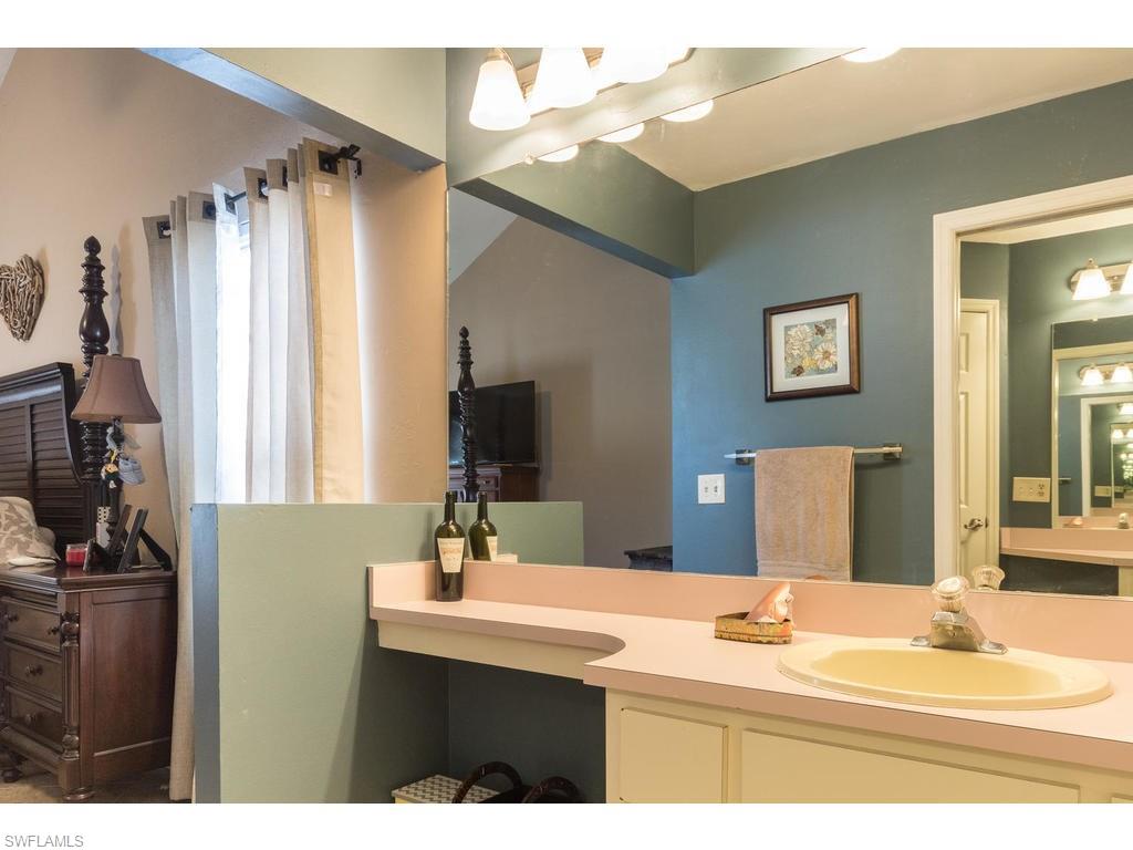 17208 Trellis Road Fort Myers, FL 33967 - Photo 10 of 22 a bathroom with a sink vanity and a mirror