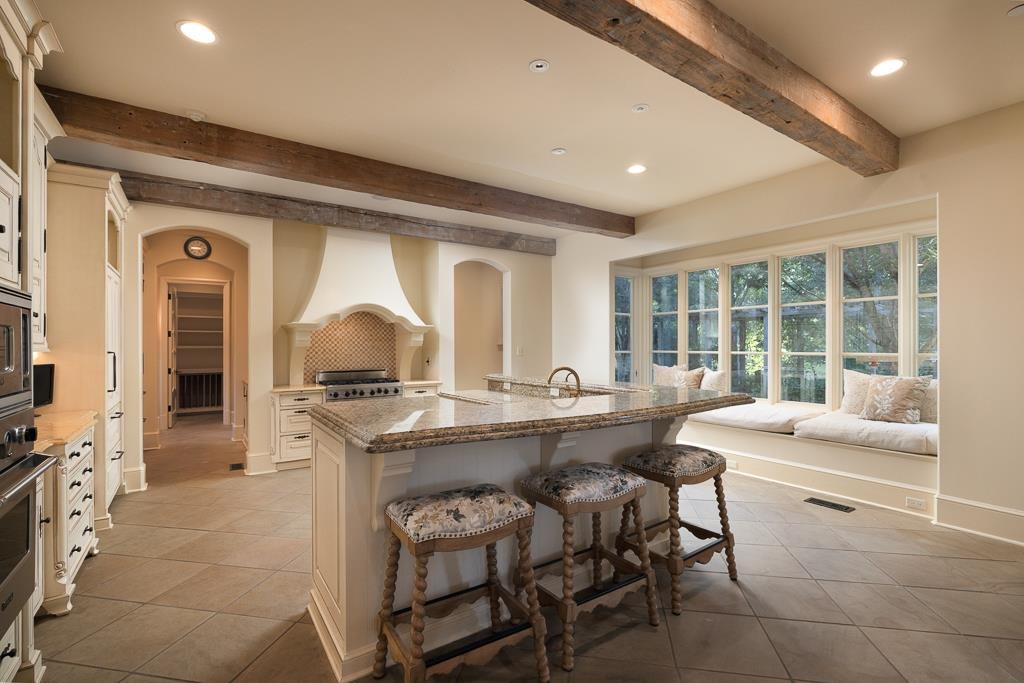 45 Pisgah Road Eads, TN 38028 - Photo 13 of 40 a dining hall with stainless steel appliances granite countertop a stove and a sink