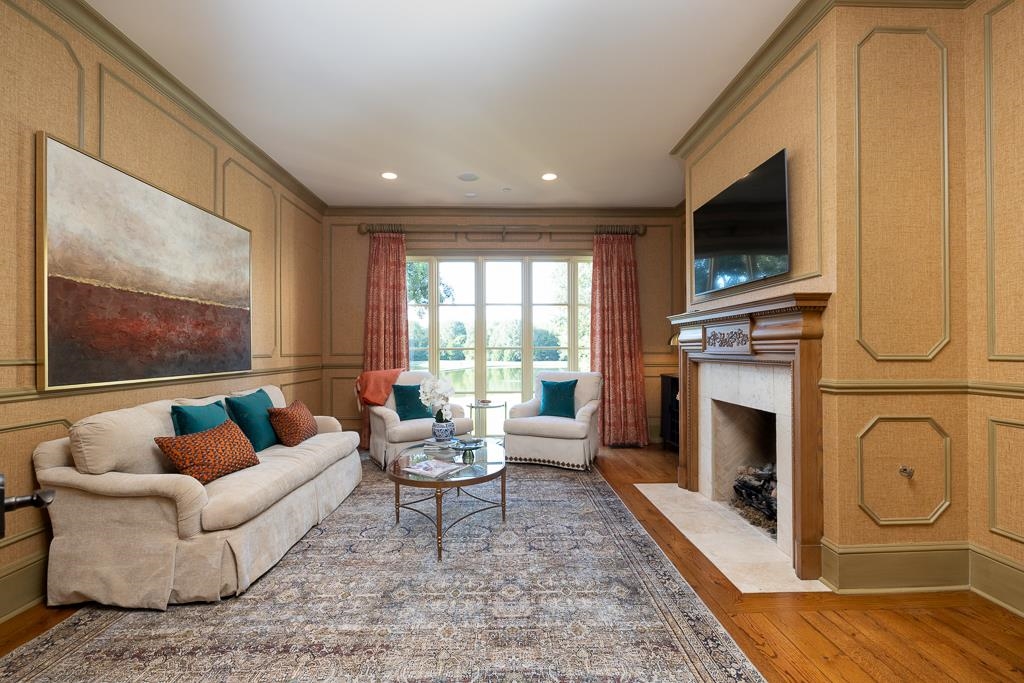 45 Pisgah Road Eads, TN 38028 - Photo 10 of 40 a living room with furniture a flat screen tv and a fireplace