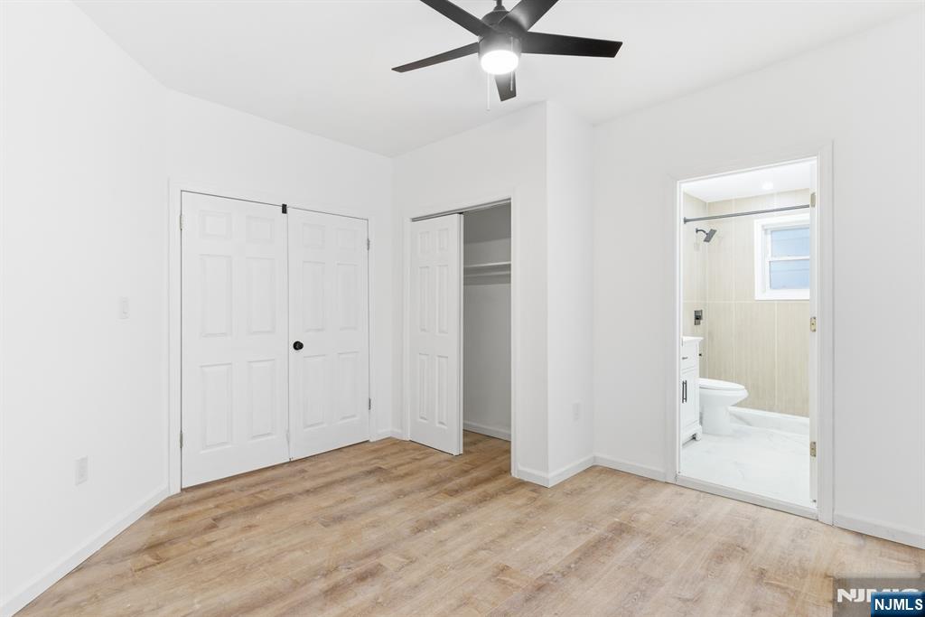 528 South 13th Street, Unit 2 Newark, NJ 07103 - Photo 13 of 21 a view of a room with a stylish ceiling fan and entryway