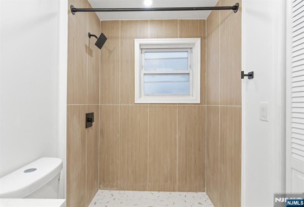 528 South 13th Street, Unit 2 Newark, NJ 07103 - Photo 19 of 21 a view of bathroom with a toilet and a sink