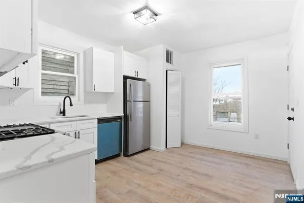 an empty room with a natural light