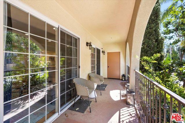 a view of a porch with furniture
