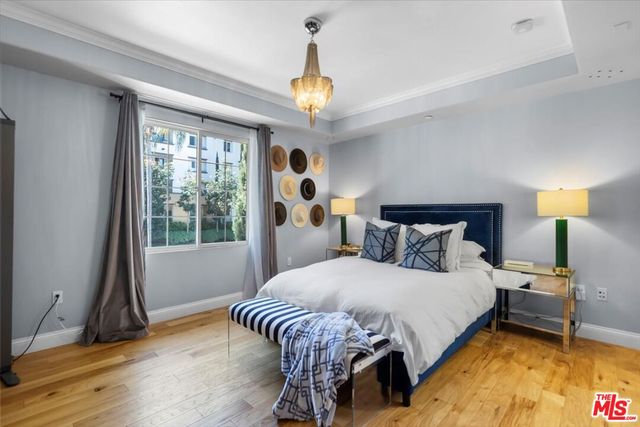 a bathroom with a double vanity sink mirror and shower