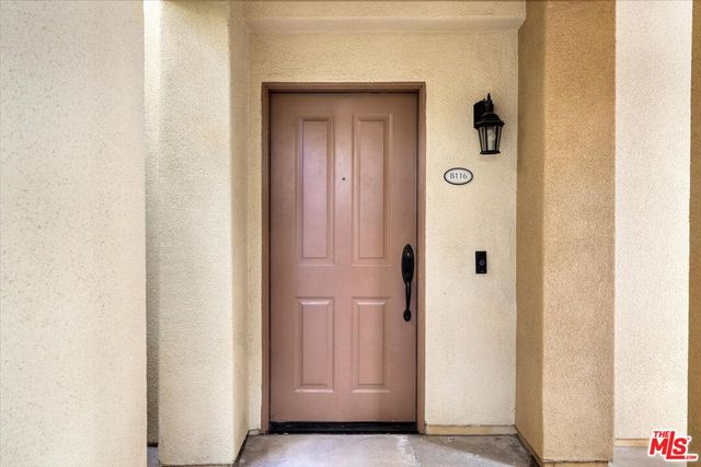 a swimming pool with outdoor seating and yard