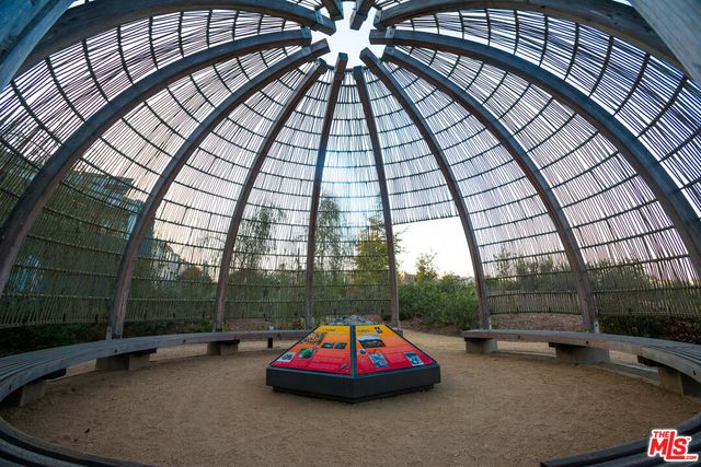 a view of swimming pool with a yard