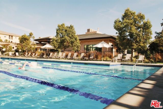 a view of people sitting in a garage