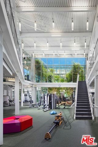 an outdoor sitting area with swimming pool