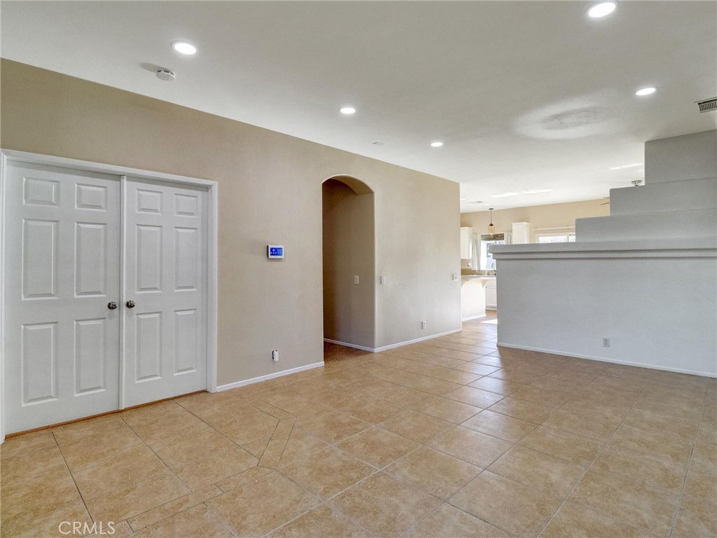 47718 Phoenix Street Indio, CA 92201 - Photo 12 of 54 a view of a livingroom with kitchen appliances