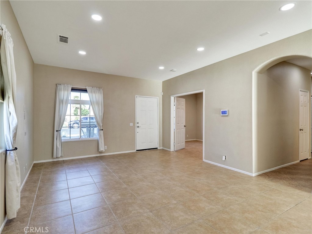 47718 Phoenix Street Indio, CA 92201 - Photo 14 of 54 a view of an empty room with a window