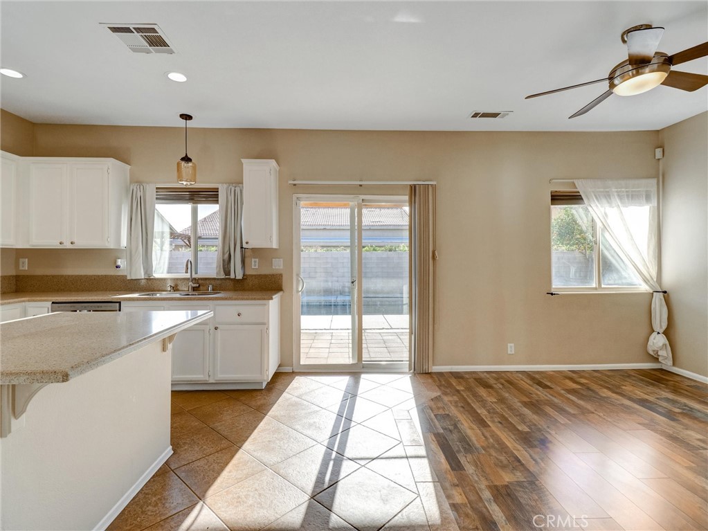47718 Phoenix Street Indio, CA 92201 - Photo 18 of 54 a view of a kitchen with a sink and cabinets