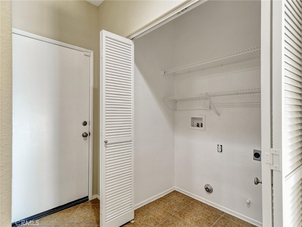 47718 Phoenix Street Indio, CA 92201 - Photo 30 of 54 a bathroom with a shower and a window