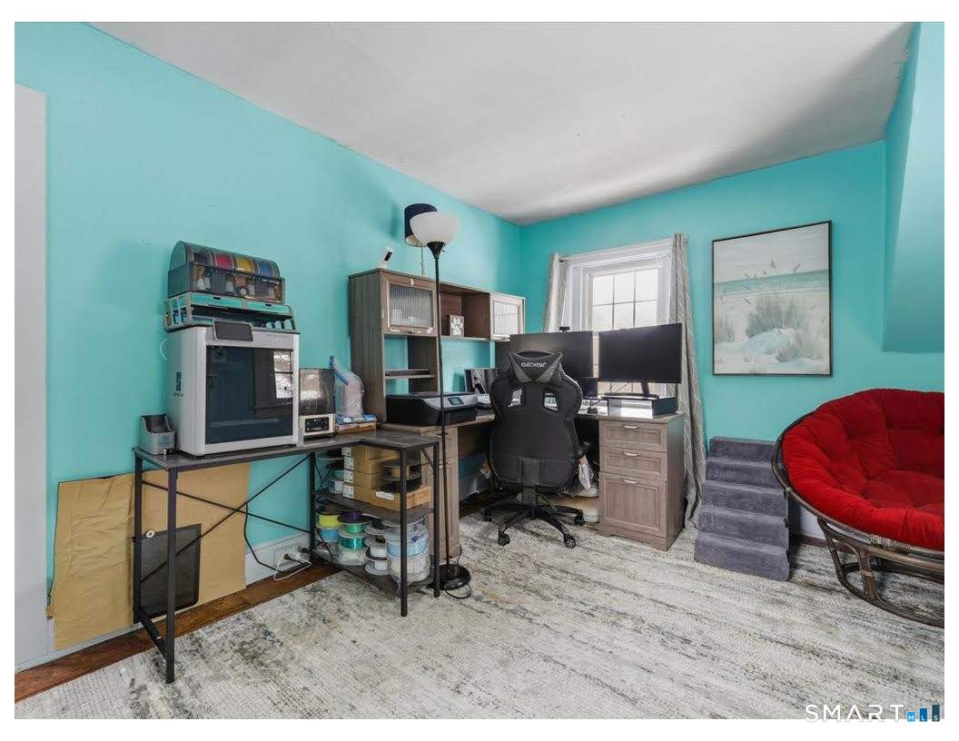 195 Bokum Road Old Saybrook, CT 06475 - Photo 12 of 30 a workspace with furniture and a window