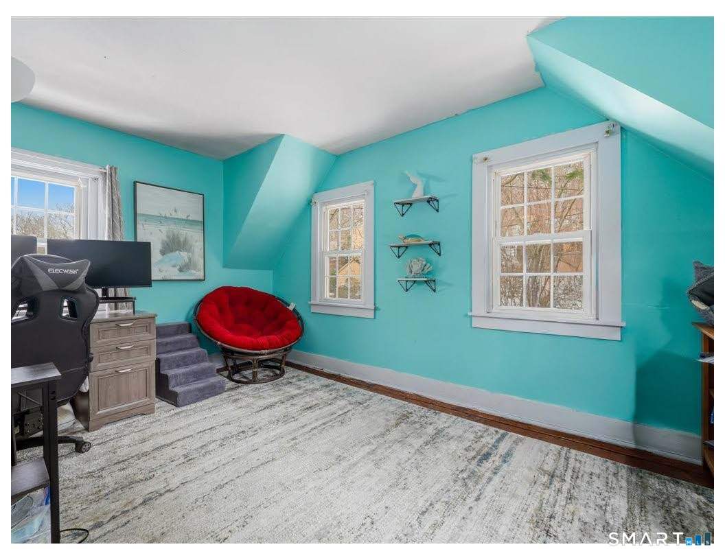 195 Bokum Road Old Saybrook, CT 06475 - Photo 13 of 30 a view of a room that has a table and a chair