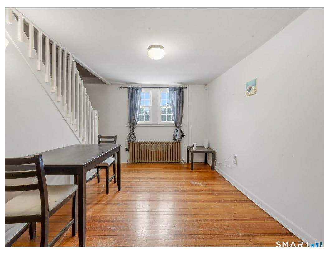 195 Bokum Road Old Saybrook, CT 06475 - Photo 18 of 30 a view of livingroom with furniture and workspace
