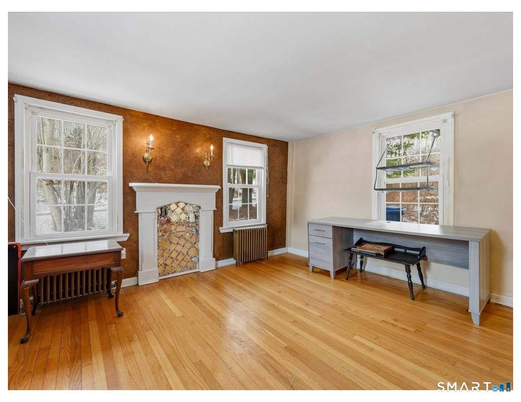 195 Bokum Road Old Saybrook, CT 06475 - Photo 19 of 30 a view of a livingroom with furniture and a window