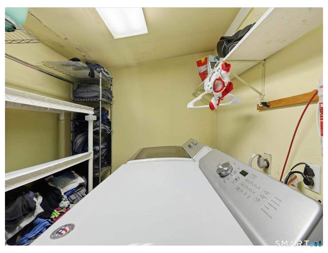 195 Bokum Road Old Saybrook, CT 06475 - Photo 20 of 30 a bedroom with a bed and a dresser