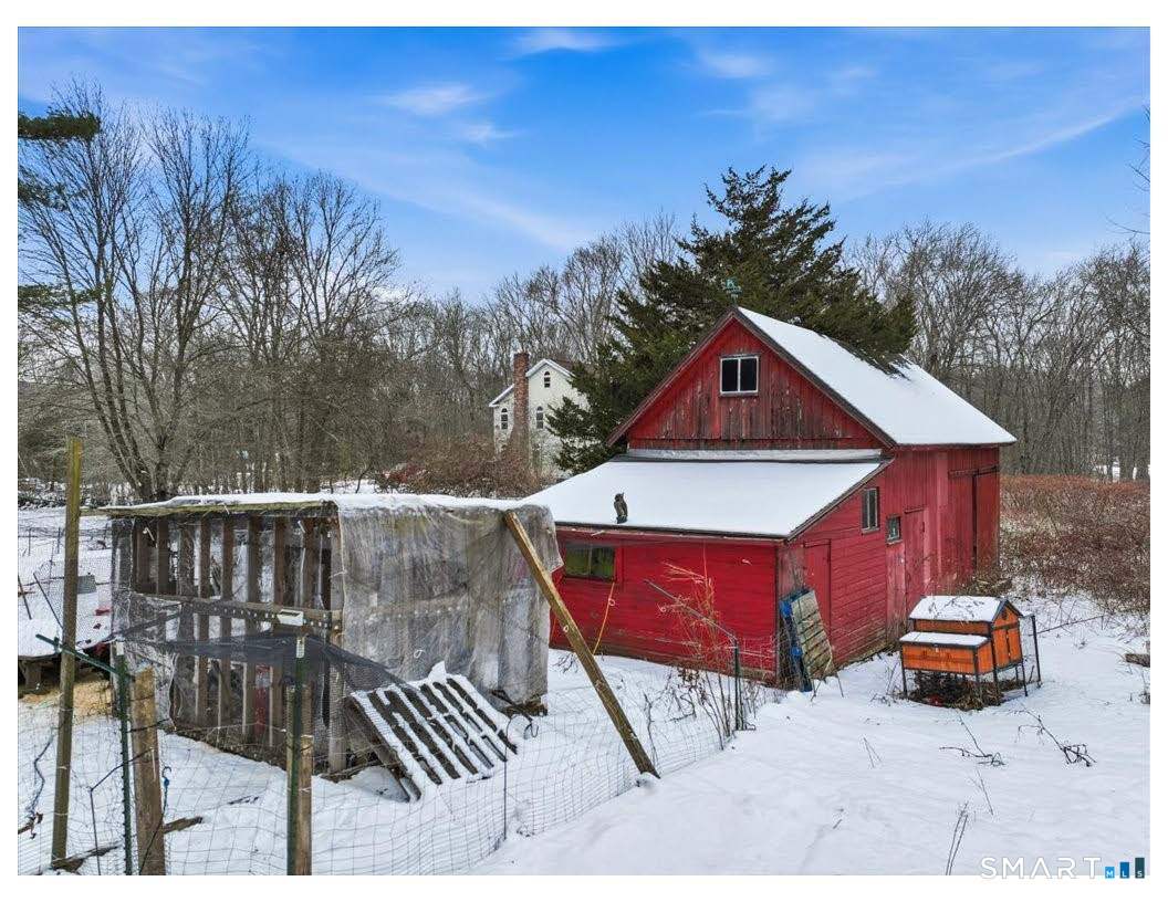 195 Bokum Road Old Saybrook, CT 06475 - Photo 25 of 30 a view of outdoor space yard and deck