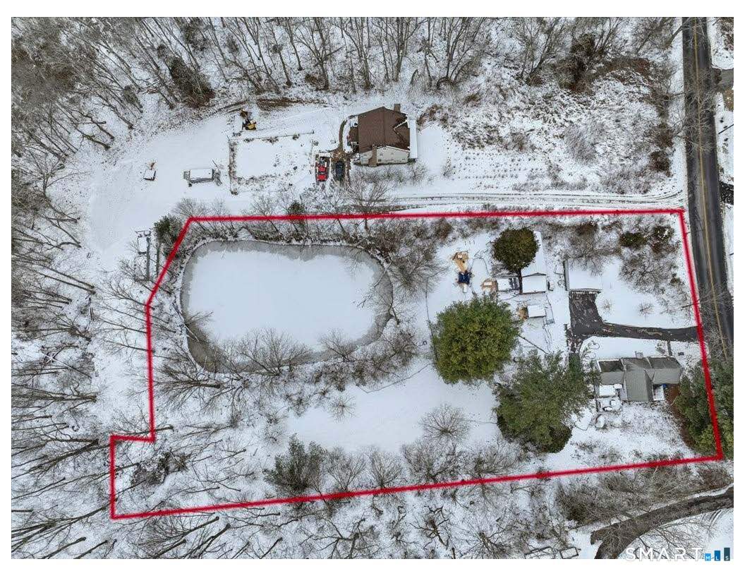 195 Bokum Road Old Saybrook, CT 06475 - Photo 26 of 30 a vase of flowers sitting on a table