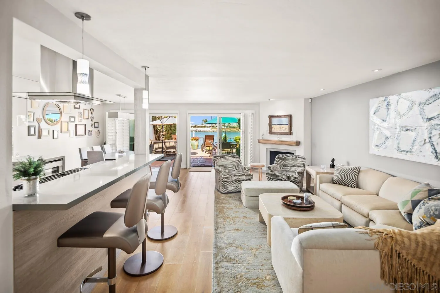 37 Antigua Court Coronado, CA 92118 - Photo 13 of 39 a living room with furniture kitchen view and a large window