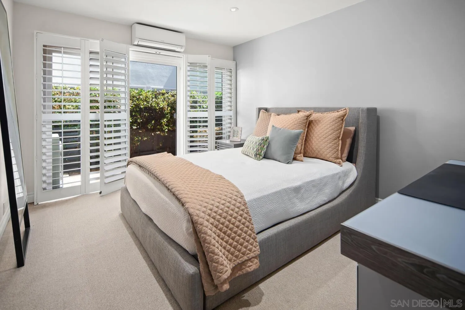 37 Antigua Court Coronado, CA 92118 - Photo 28 of 39 a large bed sitting in a bedroom next to a window